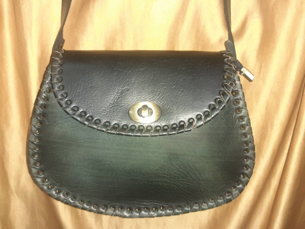 Bolso redondo vacuno asa click